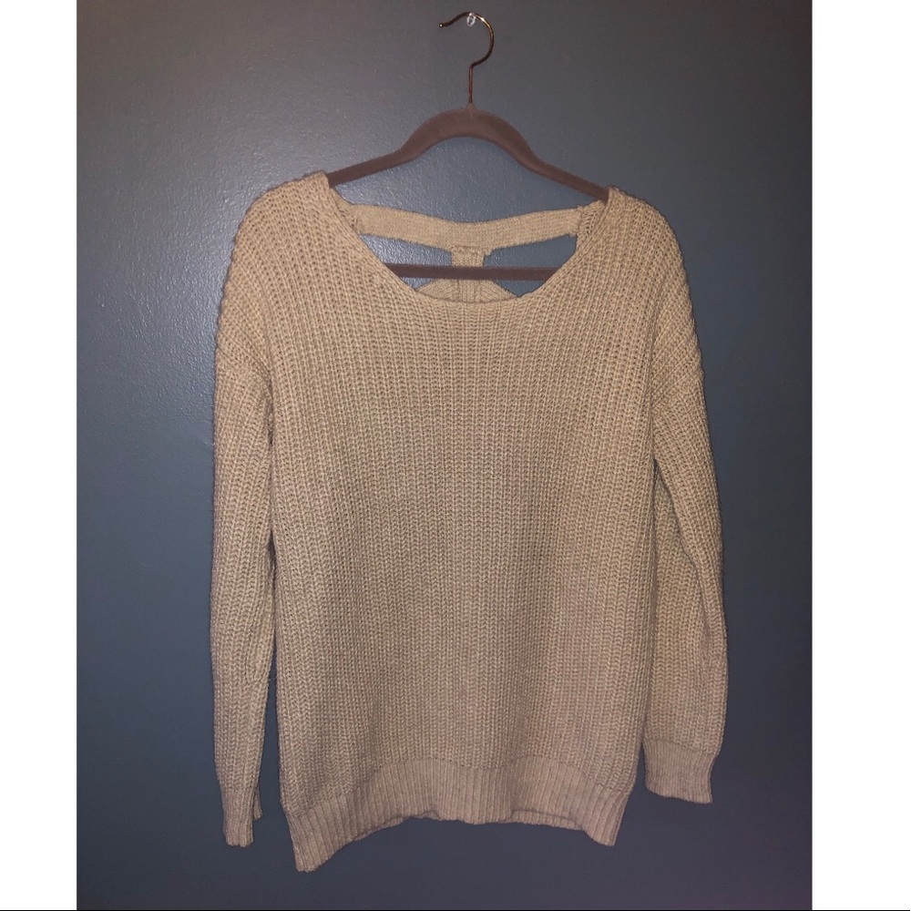 Over-sized sweater with open back design